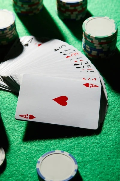 mesin228 live studio with number-tracking display and real croupier at the table